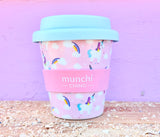 pink unicorn babyccino cup with blue lid, rainbows and clouds
