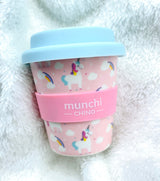 pink unicorn babychino cup with blue lid, rainbows and clouds